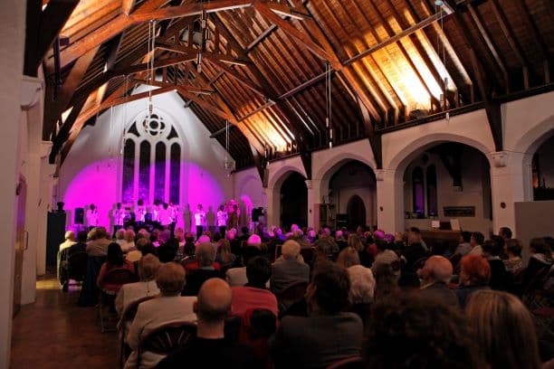 Image-  Audience in a church hall Credit Betina Skovbro