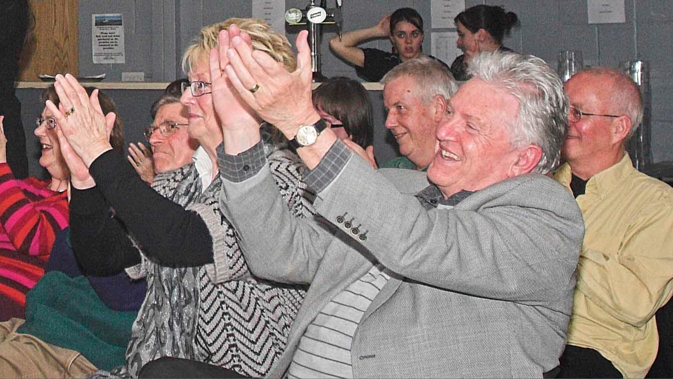 Image: Audience clapping Photo Credit CP Imaging