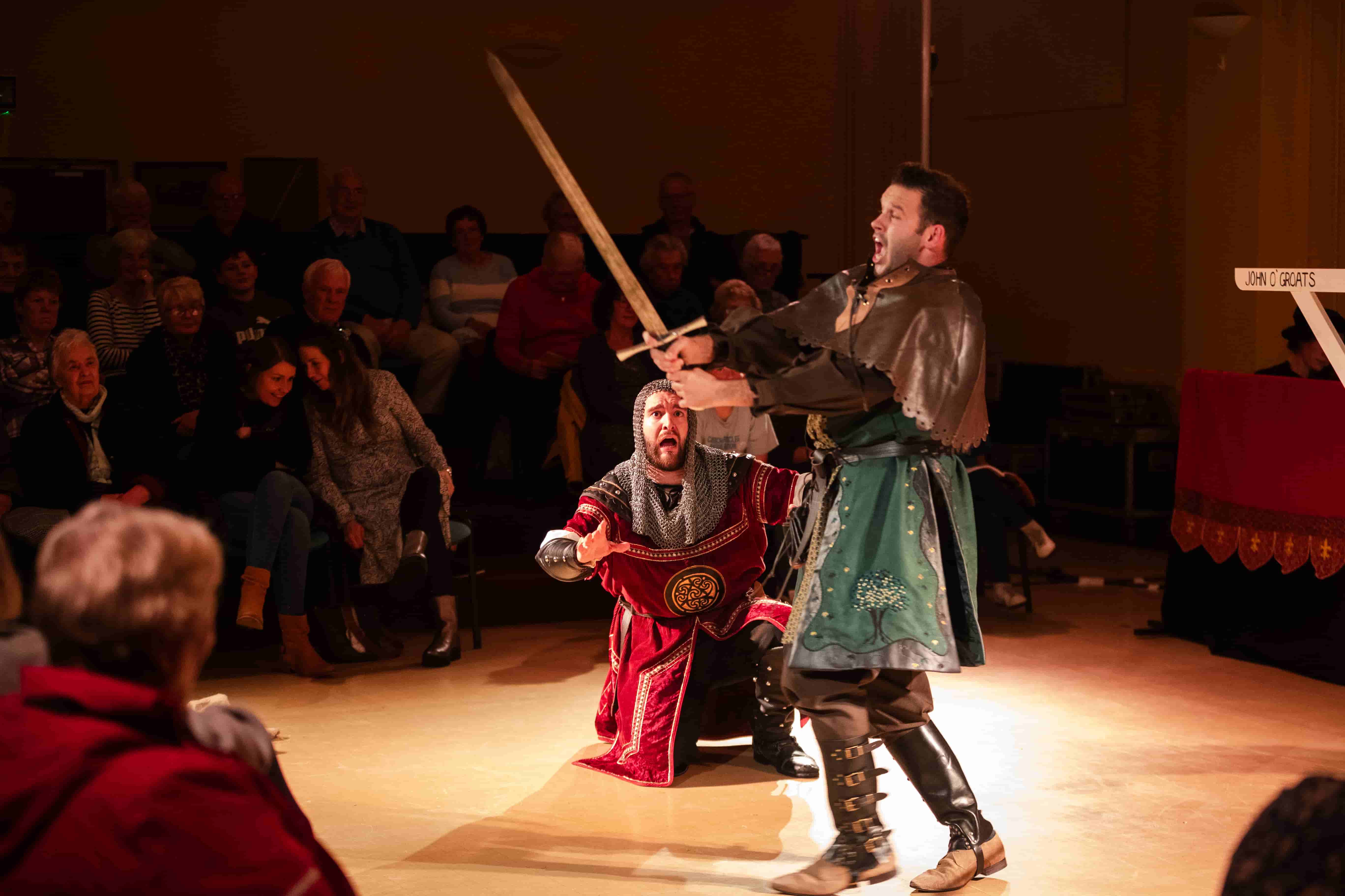 Image- 2 performers with swords, from Opra Cymru Credit: Ffotonant
